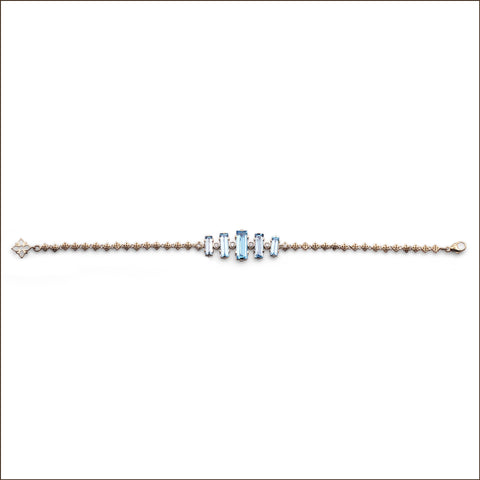 Luxury Aurora Swiss Blue Topaz and 0.15ct Diamond Bracelet in 18K Gold