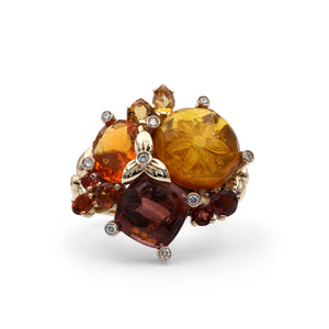 Luxury Pink Tourmaline 4.55ct Internally Carved Amber 2.2ct Fire Opal 0.95ct Garnet 0.45ct Orange Sapphire 0.45ct Citrine 0.40ct and Diamond 0.20ct Ring in 18K Gold