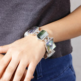 One of a Kind Blue Topaz, Azurit, Blue Peacock,Tourmaline Rough, Blister Pearl and Green Amethyst Facet Bracelet in Sterling Silver with 18K Gold Adam Bug